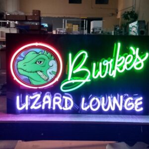 A neon sign that reads " burke 's lizard lounge ".