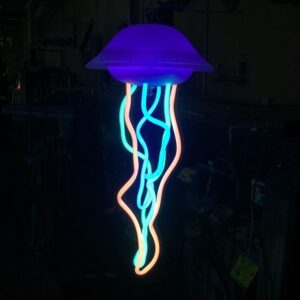 A glowing jellyfish hanging from the ceiling.